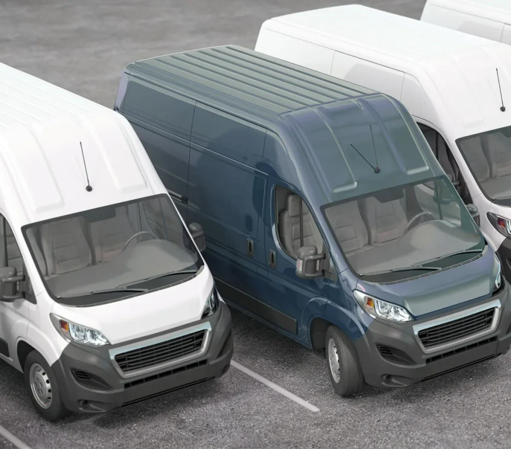 Row of white light commercial delivery vans