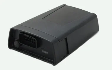 Compact GNSS vehicle tracker with a wiring socket